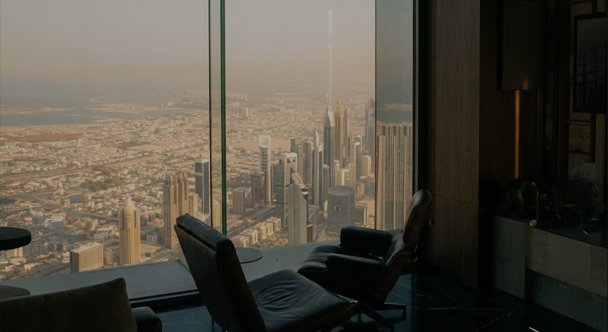 A trading floor at dusk overlooking the city skyline